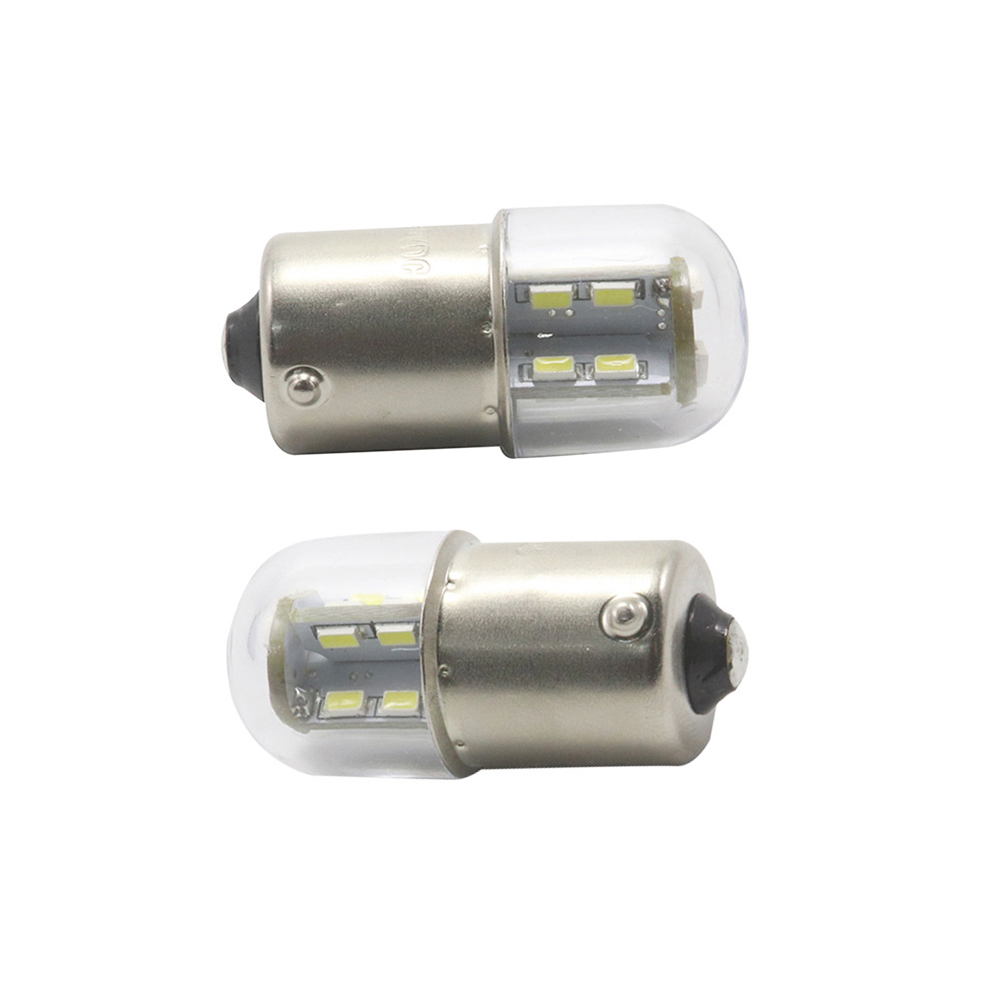 G18 LED globe bulb illuminated in warm amber signaling light bench test