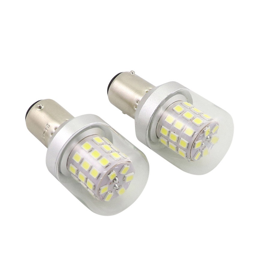Dual contact bayonet base detail with nickel plating on T28 short LED bulb