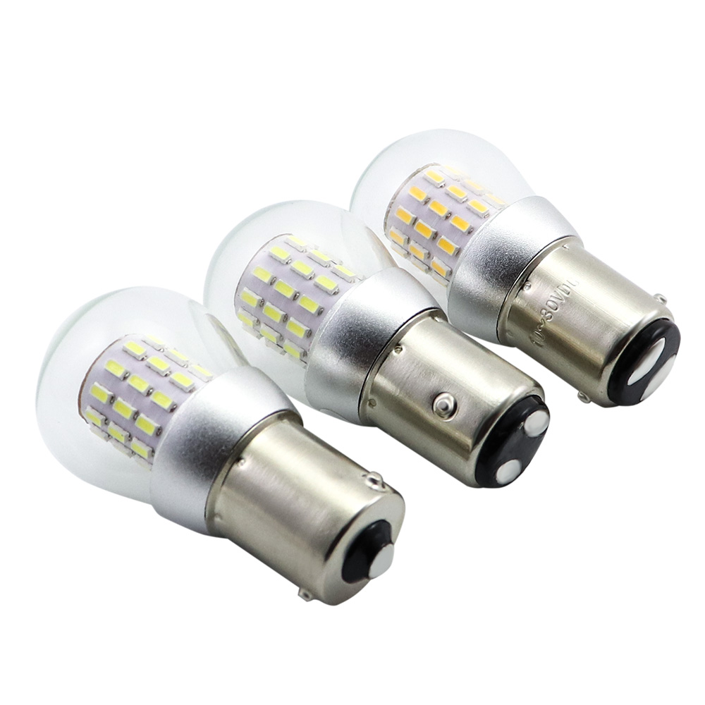 Pair of S25 marine LED navigation bulbs standing perspective studio display