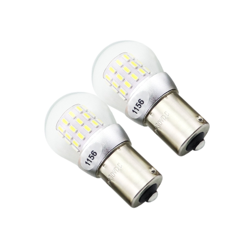 Pair of 1156 automotive LED signal bulbs showing standing and horizontal base comparison